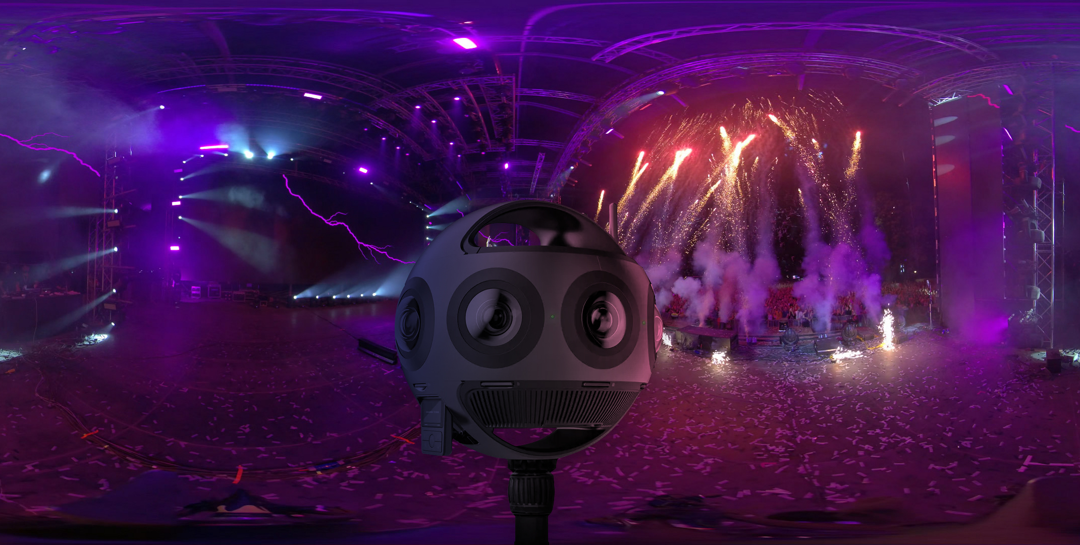 360-degree virtual reality camera capturing an indoor concert with vibrant stage lights, fireworks, and dynamic effects in an immersive environment.